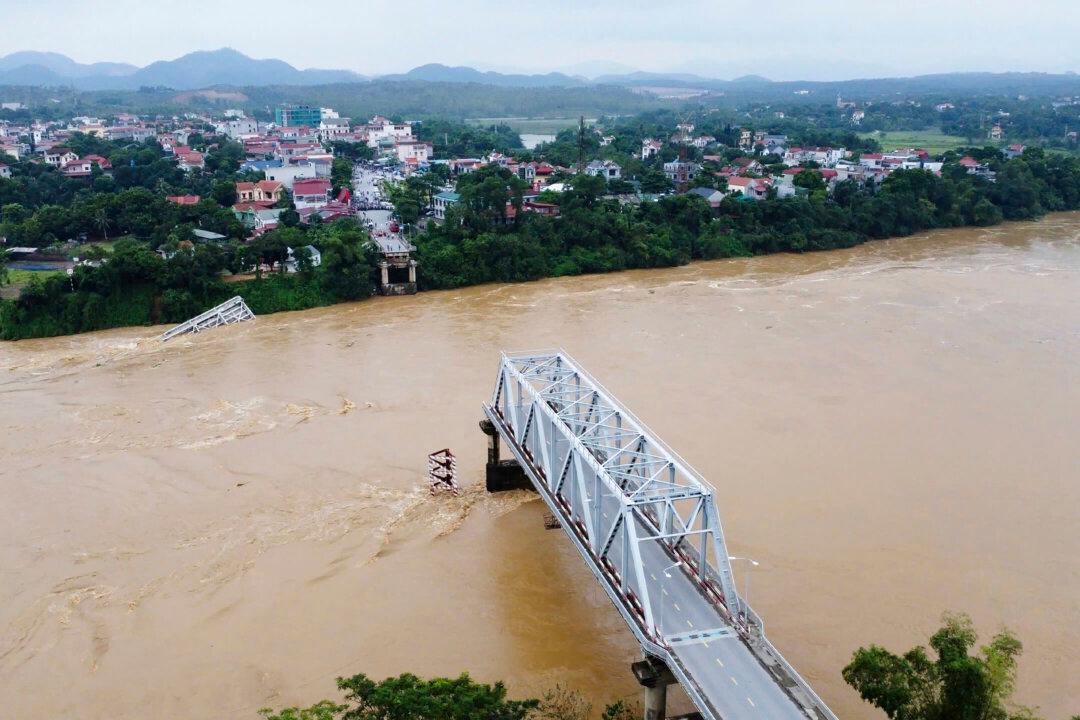 Bridge Collapses Amid Heavy Rain in Vietnam Following Typhoon Yagi