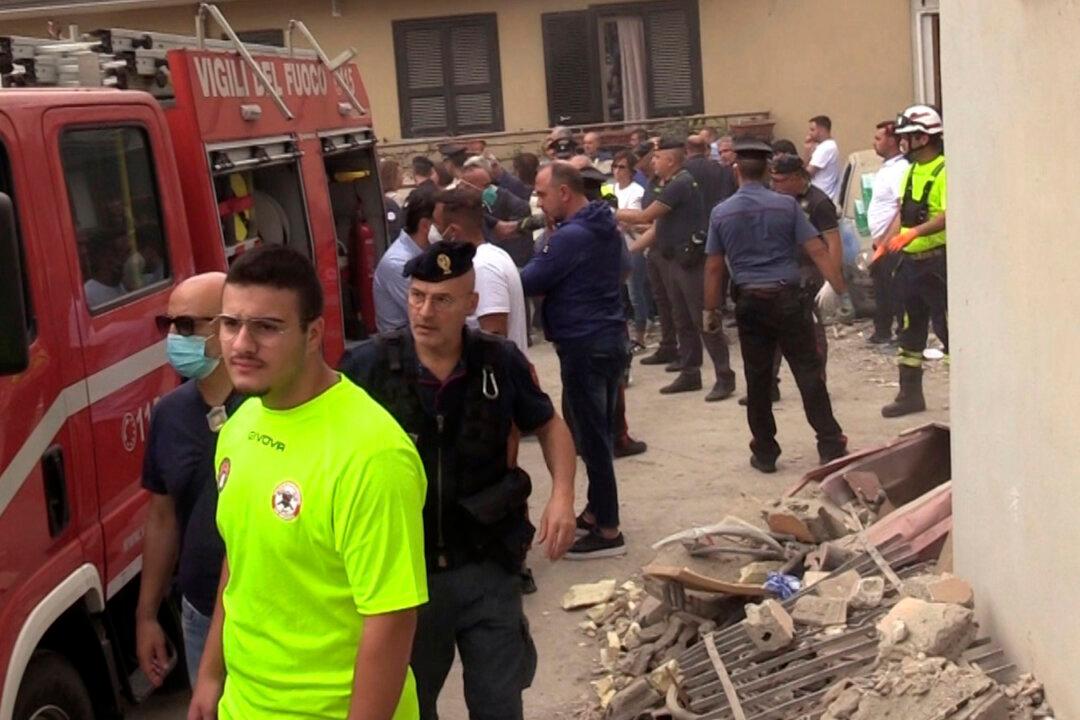 Building Collapse in Italy Kills 2 Young Siblings and Their Mother