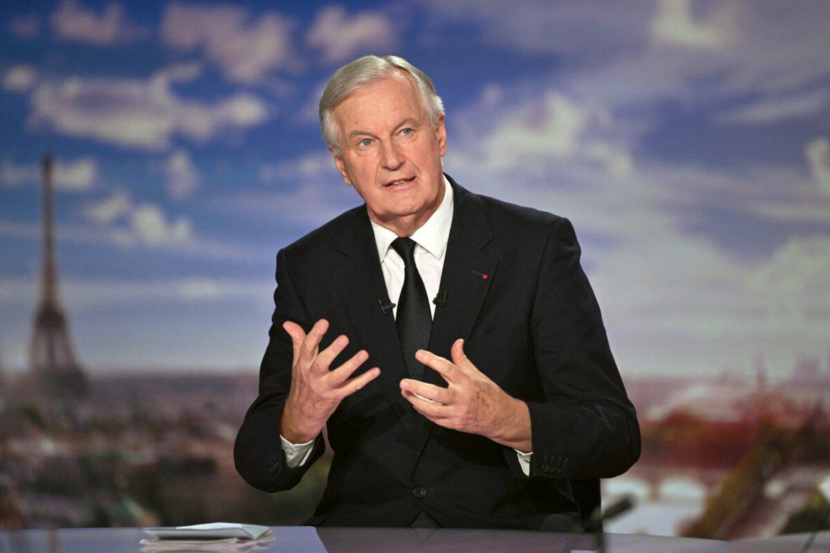 French Prime Minister Michel Barnier speaks during the evening news broadcast of French TV channel France 2 at the France Televisions studios in Paris on Sept. 22, 2024. (Julie Sebadelha/POOL/AFP via Getty Images)