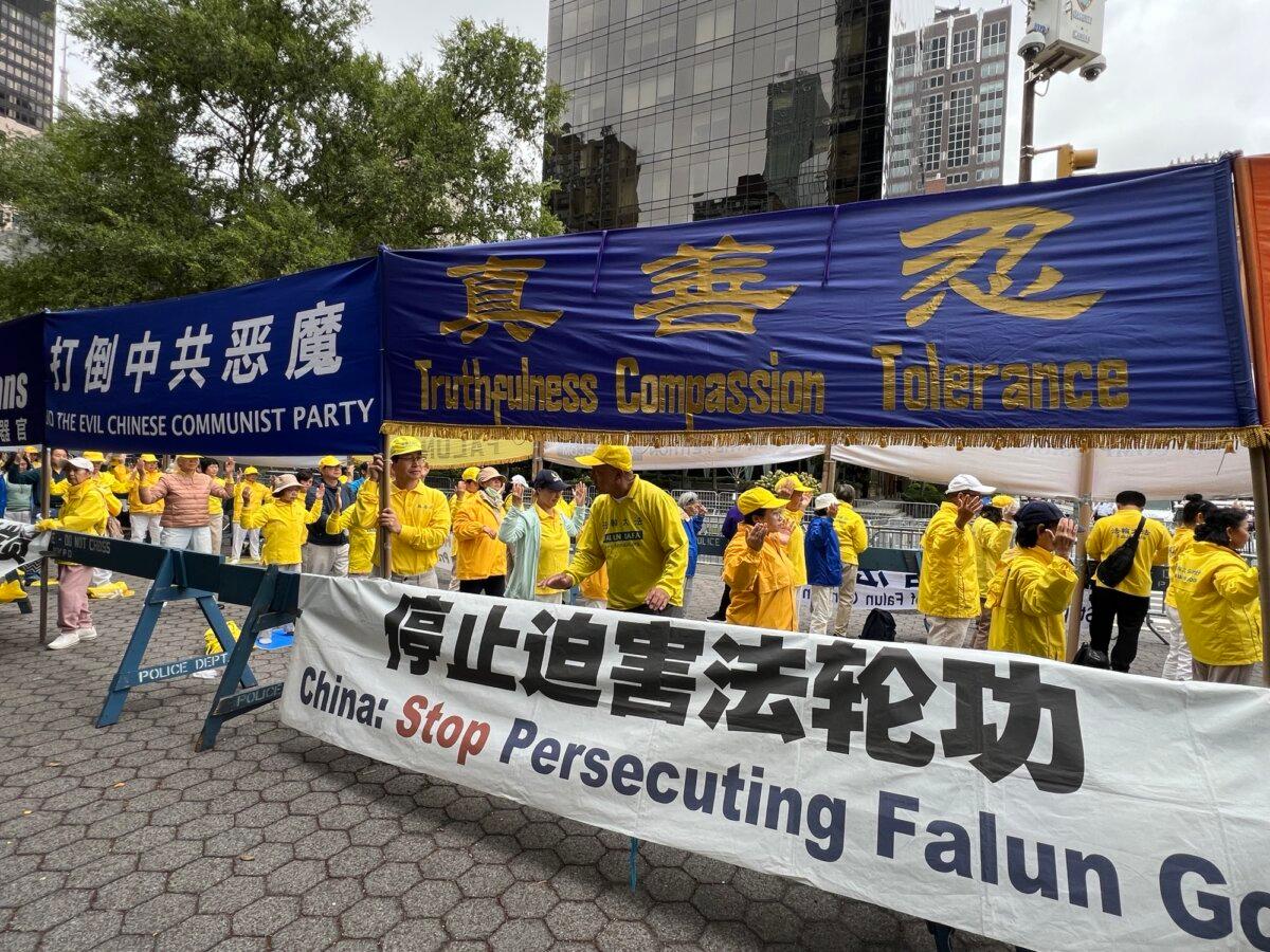 Falun Gong practitioners in New York City on Sept. 25, 2024 protest the Chinese Communist Party's ongoing persecution of Falun Gong and the regime's human rights abuses. (Sunny Zhao/The Epoch Times)