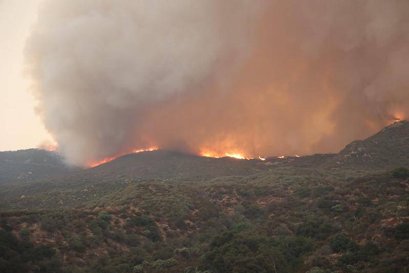 California’s Line Fire Flares Under High Temperatures, Makes Run up Santa Ana River
