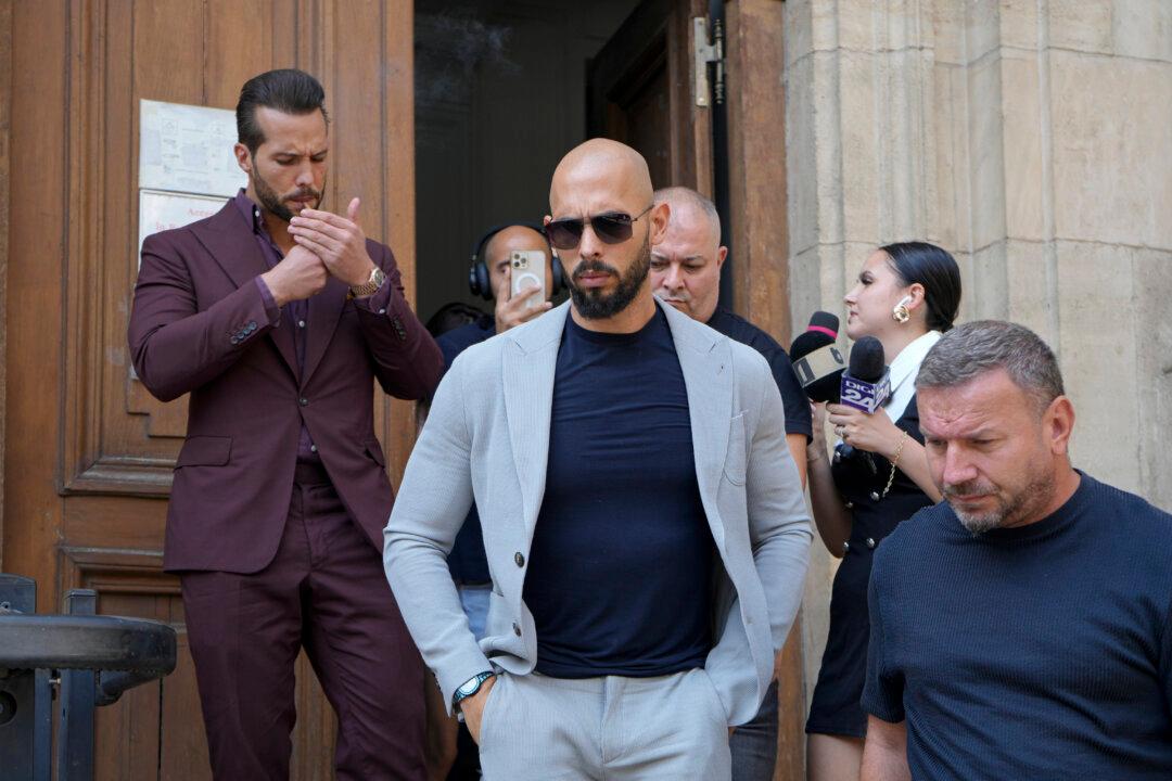 Andrew Tate Accused of Pointing Gun in Woman’s Face, Court Documents Say