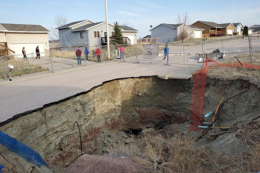 Giant Sinkholes in South Dakota Neighborhood Make Families Fear for Their Safety