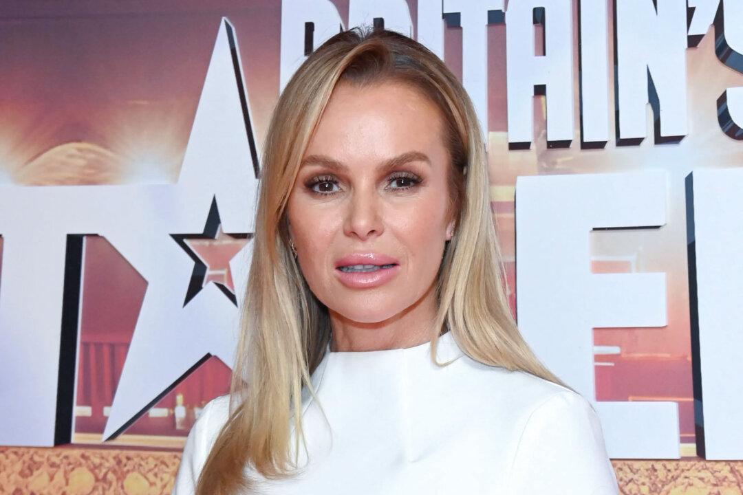 UK Presenter Amanda Holden Says She’s ‘Soaked to the Skin’ as She Cycles 250 Miles for Charity