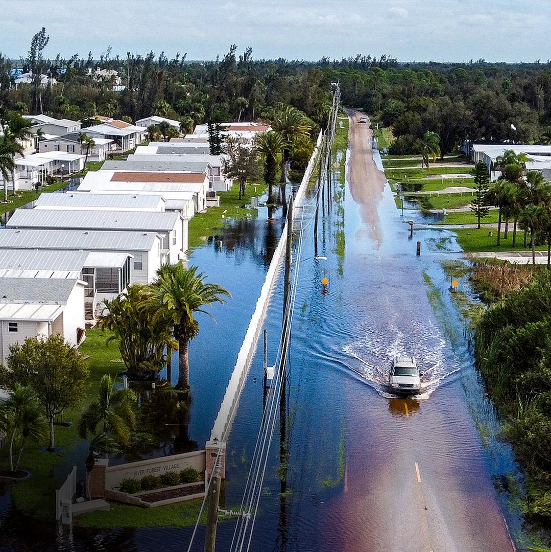 Day in Photos: Historic Settlement, Milton Aftermath, and a Royal Visit