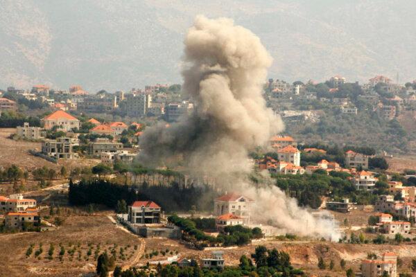 Smoke rises from the site of an Israeli airstrike, amid the continuing war between Hezbollah and Israel, that targeted the southern Lebanese village of Khiam on Oct. 13, 2024. (AFP via Getty Images)