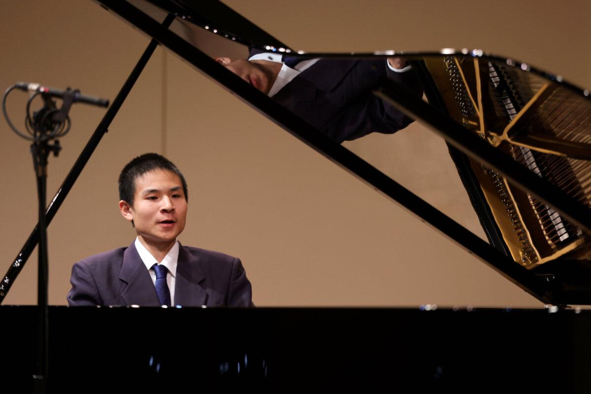Tom Han performs at NTD's 7th International Piano Competition at the Kaufman Music Center in New York on Oct. 15, 2024. (The Epoch Times)