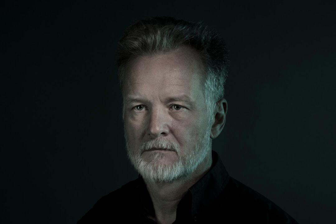 Teen Son Charged in Fatal Stabbing Death of Photojournalist