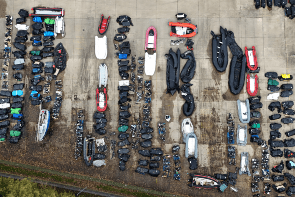 A view of small boats and outboard motors used by illegal immigrants to cross the English Channel at a warehouse facility in Dover, Kent, England, on Oct. 31, 2024. (Gareth Fuller/PA Wire)