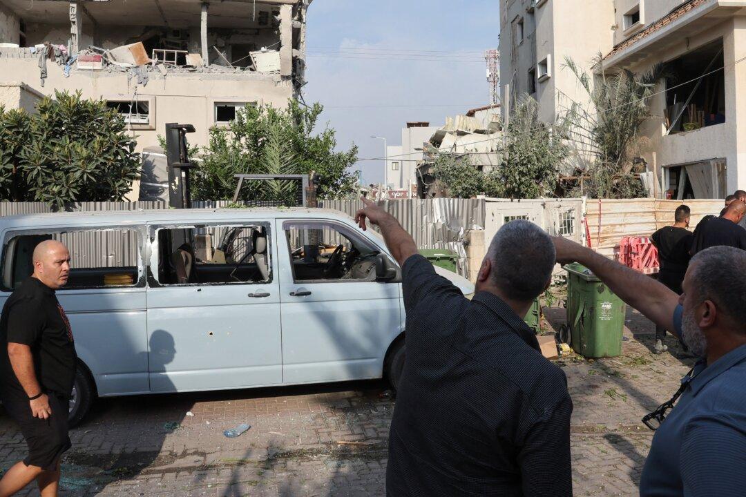 Attack on Central Israel Injures 11 as Iran’s Leader Promises a Punishing Response