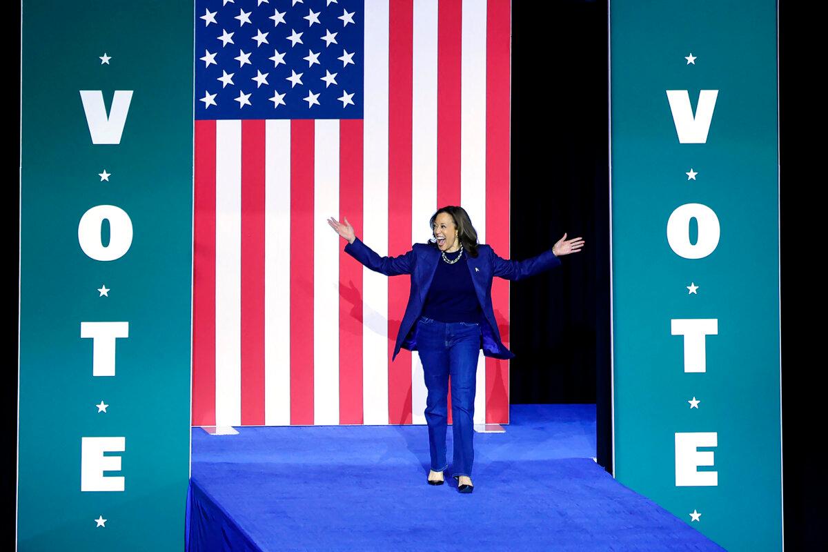 Vice President and Democratic presidential nominee Kamala Harris walks on stage as she arrives for a campaign rally at Michigan State University's Jenison Field House in East Lansing, Michigan, on Nov. 3, 2024. (Jeff Kowalsky/AFP via Getty Images)