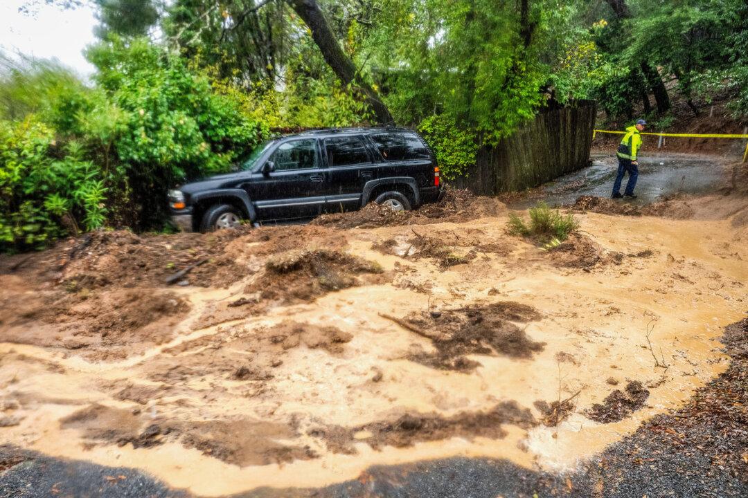Storm Inundates Northern California With Rain, Heavy Snow; Thousands Remain in the Dark in Seattle