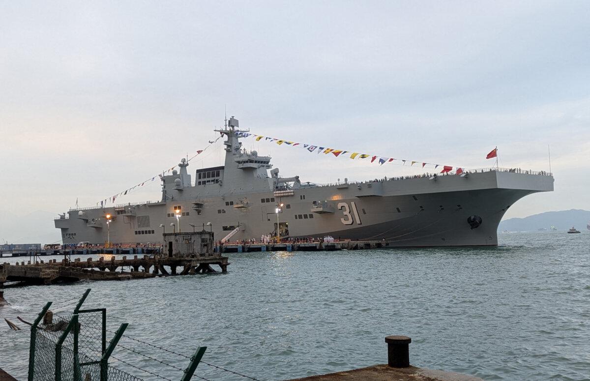 The amphibious assault ship, Hainan is docked at the China Merchants Wharf in Hong Kong on Nov. 24, 2024. (Holmes Chan/AFP via Getty Images)