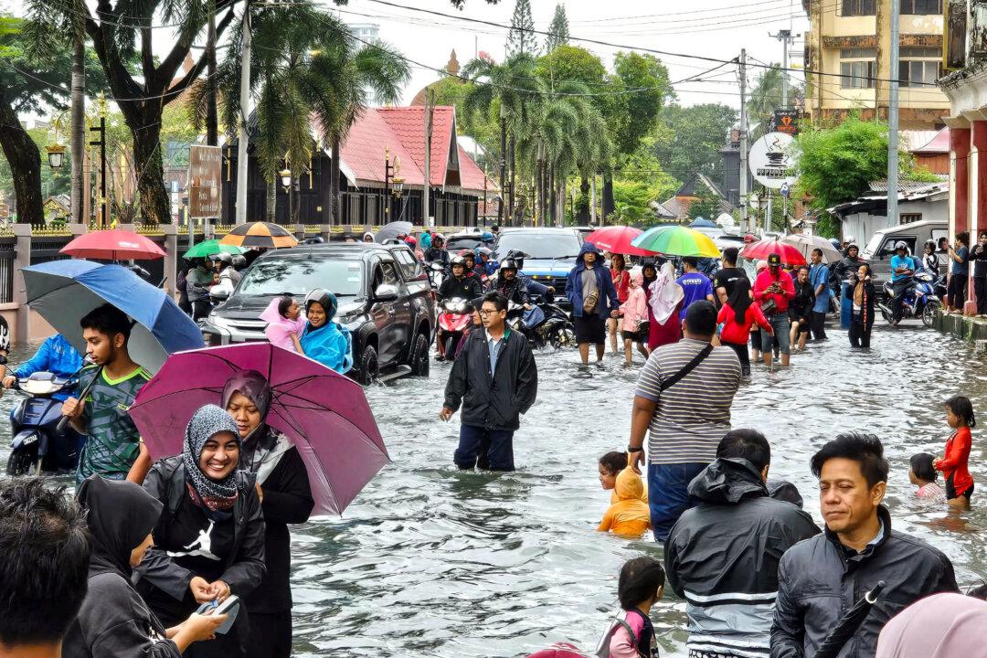 3 Dead, Thousands Evacuated as Heavy Rains Unleash Flooding in Malaysia