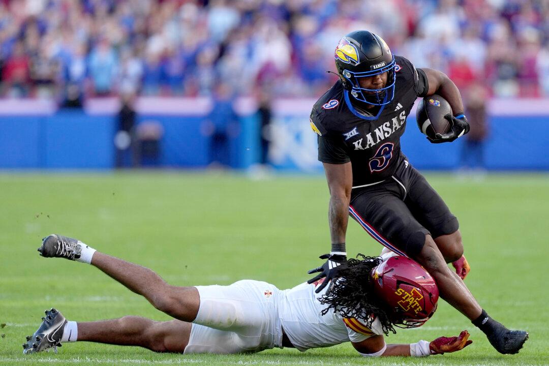 Devin Neal Sets Kansas Career Rushing Records in 45–36 Victory Over No. 17 Cyclones