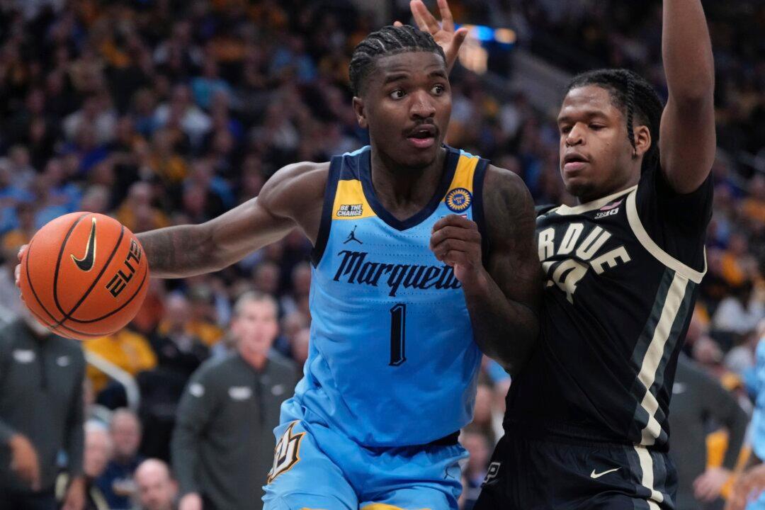 Kam Jones Gets Triple-Double as No. 15 Marquette Trounces No. 6 Purdue 76-58