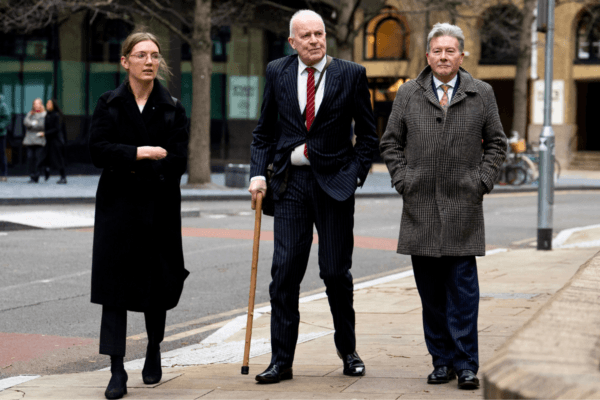 Former human rights lawyer Phil Shiner (centre) outside Southwark Crown Court where he was handed a suspended sentence for three counts of fraud, in London, on Dec. 10, 2024. (Jordan Pettitt/PA Wire)