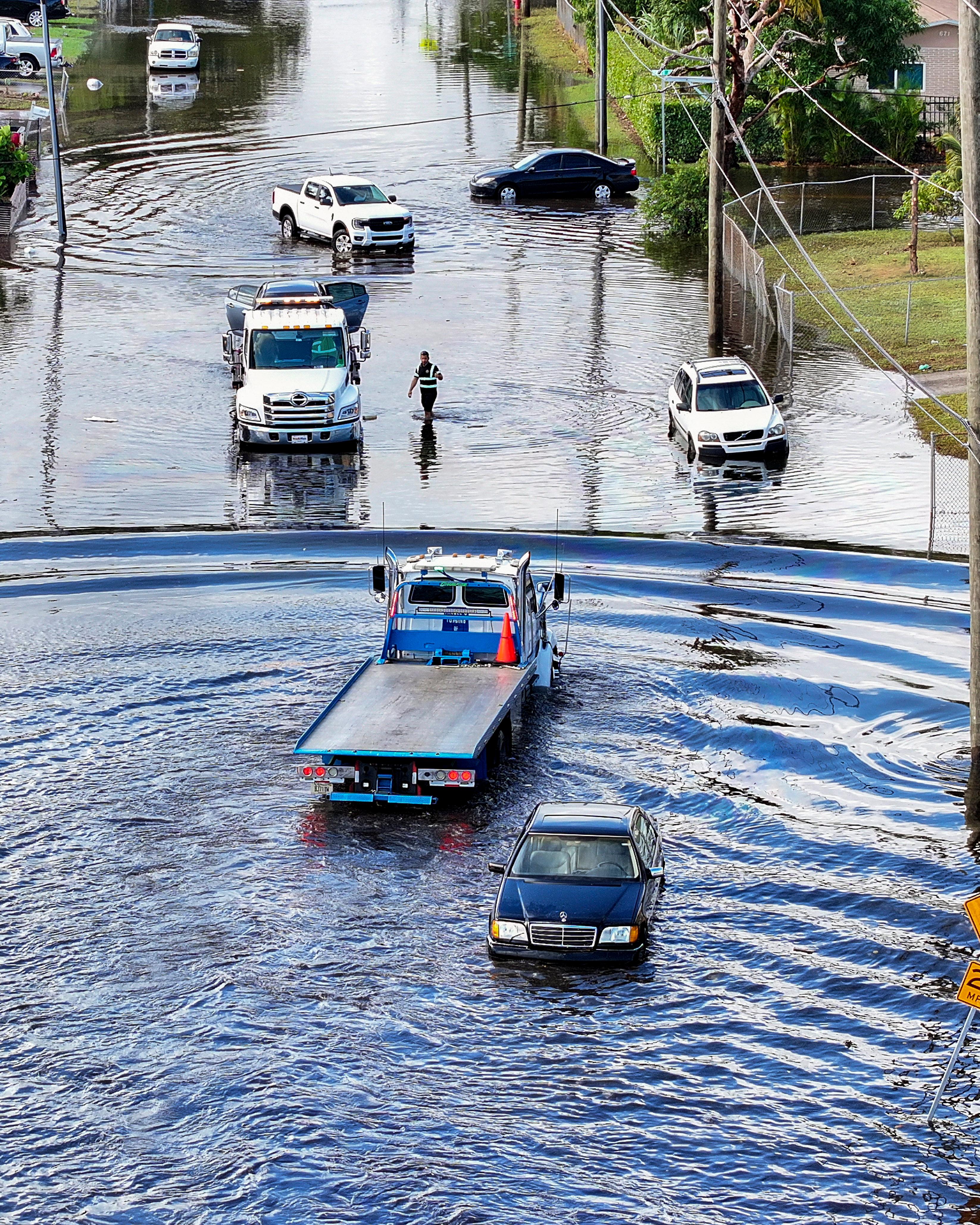 Day in Photos: Flooded Florida, Argentina Plane Crash, Concert at the Royal Palace