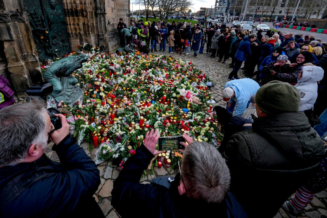 Germans Mourn the 5 Killed and 200 Injured in the Apparent Attack on a Christmas Market