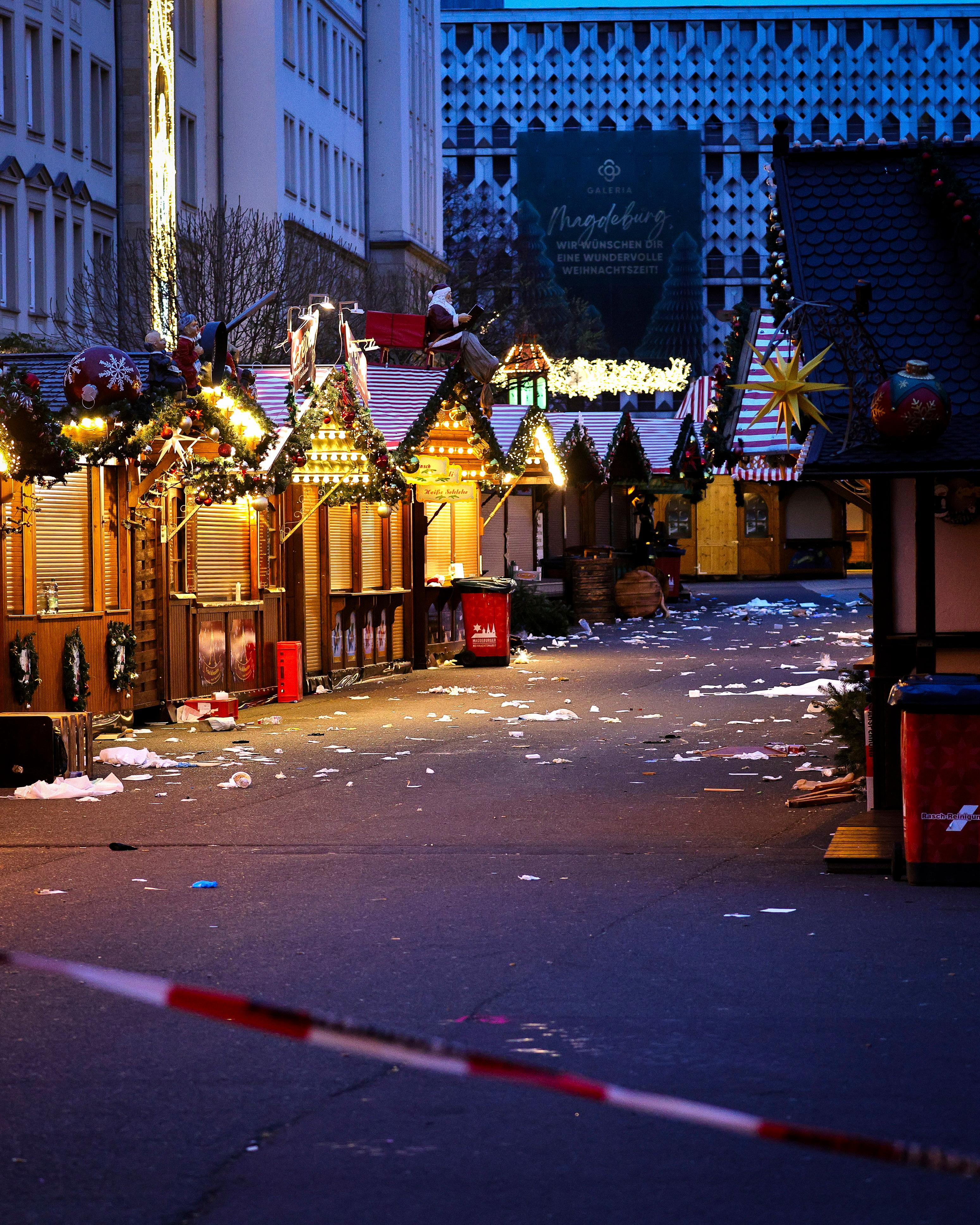 Day in Photos: Terrorist Attack in Germany, Winter Solstice at Stonehenge, and Balloon Festival