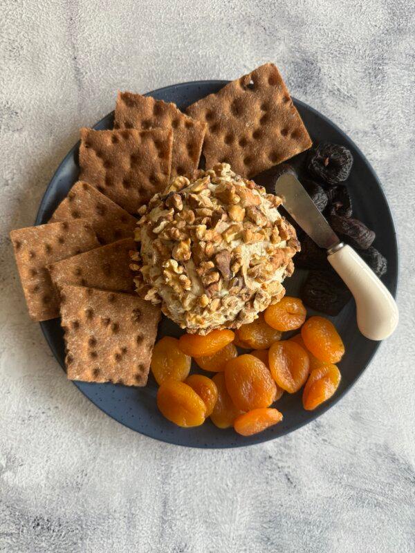 Honey and dried fruits give this cheese ball its sweetness, while toasted walnuts add a satisfying crunch. (JeanMarie Brownson/TCA)