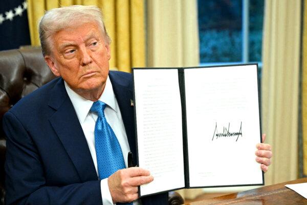 U.S. President Donald Trump speaks to the press after signing an executive order in the Oval Office of the White House in Washington, D.C., on Jan. 31, 2025. (Mandel Ngan/AFP via Getty Images)