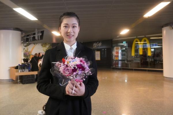 Shen Yun's principal dancer Kathy Wu at the Warsaw Chopin Airport, on Dec. 31, 2024. (Mary Man/The Epoch Times)