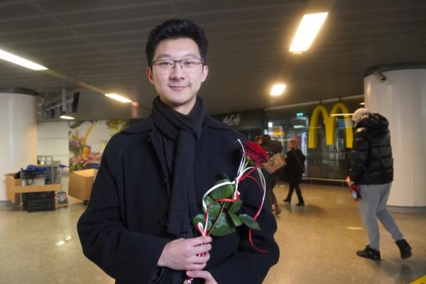 Shen Yun's violinist Steven Song at the Warsaw Chopin Airport on Dec. 31, 2024. (Mary Man/The Epoch Times)