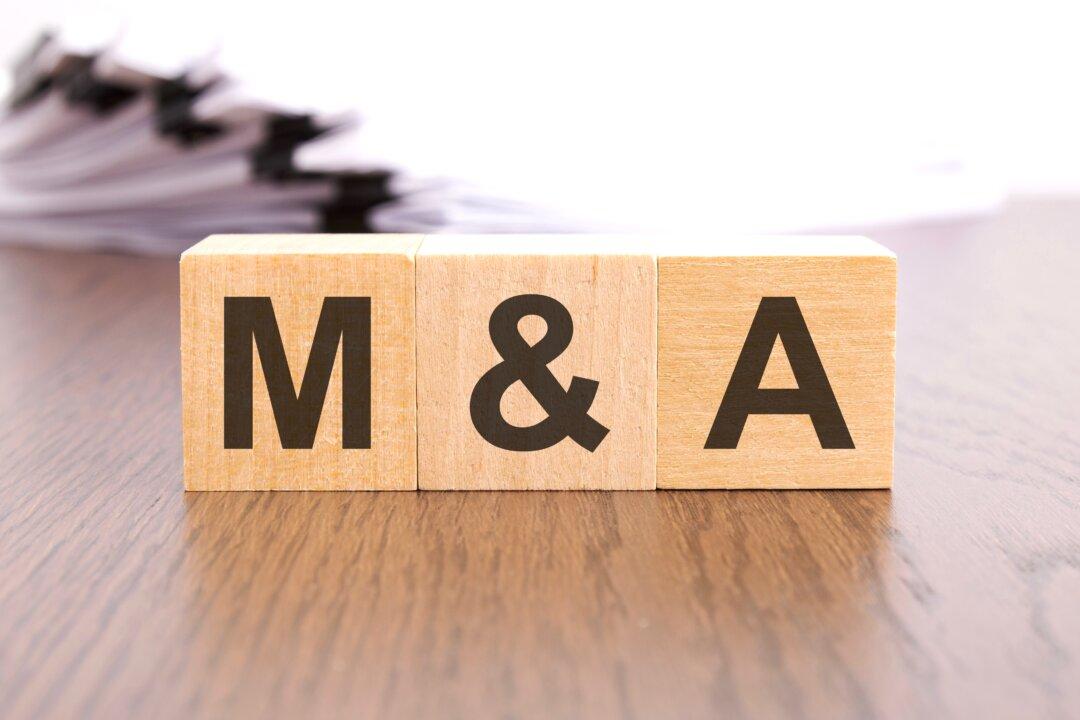 Mergers and Acquisitions Will Accelerate in 2025, With Tech Deals Leading the Way, Analysts Say