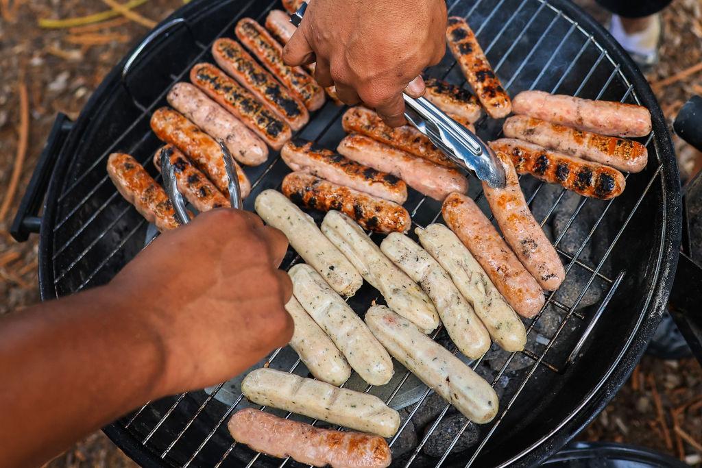 Sausages are cooked on the BBQ at Ramsgate Beach, Botany Beach in Sydney, Australia, on Jan. 26, 2024. (Jenny Evans/Getty Images)