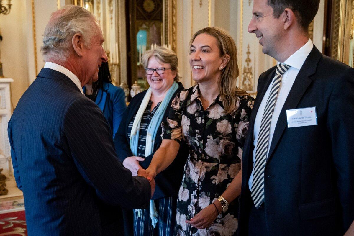 King Charles III greets Permanent Secretary of the Ministry of Justice Antonia Romeo during a reception for recipients of The King's Award for Enterprise, at Buckingham Palace in London, on June 27, 2023. (Aaron Chown/POOL/AFP via Getty Images)