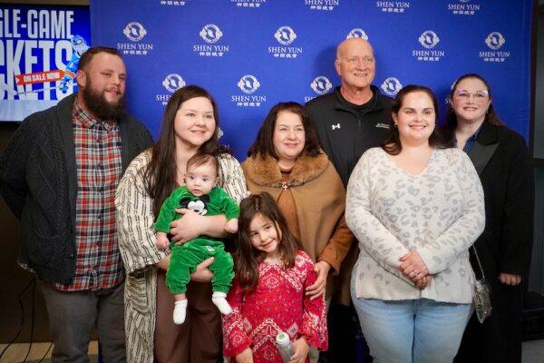 Sid Edwards and his family at the Shen Yun Performing Arts performance at Baton Rouge River Center Theatre on Jan. 12, 2025. (Sonia Wu/The Epoch Times)