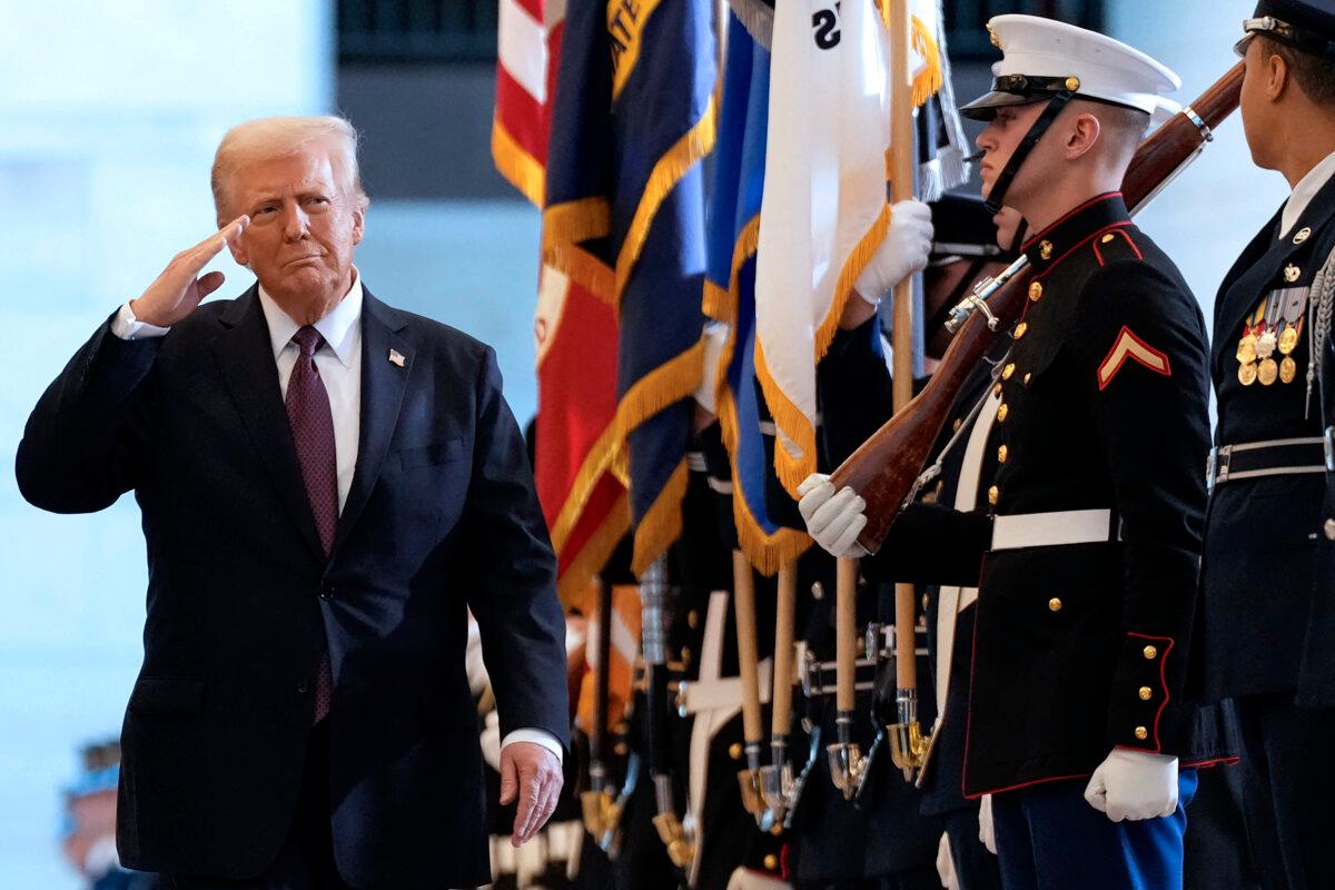 President Donald Trump reviews the troops during the Honors ceremony in Emancipation Hall at the U.S. Capitol on Jan. 20, 2025. (Greg Nash//POOL/AFP via Getty Images)