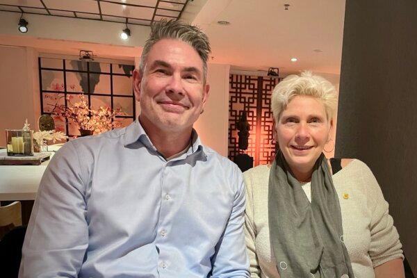 Marc Merkestein and his wife enjoy Shen Yun Performing Arts at the World Forum Theater in the Hague, Netherlands, on Jan. 16, 2025. (Gokhan Tunc/The Epoch Times)