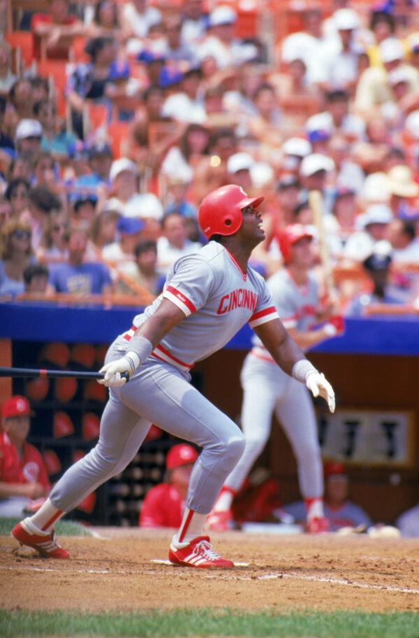 Dave Parker #39 of the Cincinnati Reds watches the flight of the ball as he follows through on his swing during a game with the New York Mets at Shea Stadium in Flushing, New York, in 1987. (Scott Halleran/Getty Images)