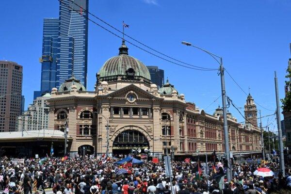 Demonstrators take part in the annual "Invasion Day" protest march through the streets of Melbourne on Australia Day on Jan. 26, 2025. (PAUL CROCK/AFP via Getty Images)