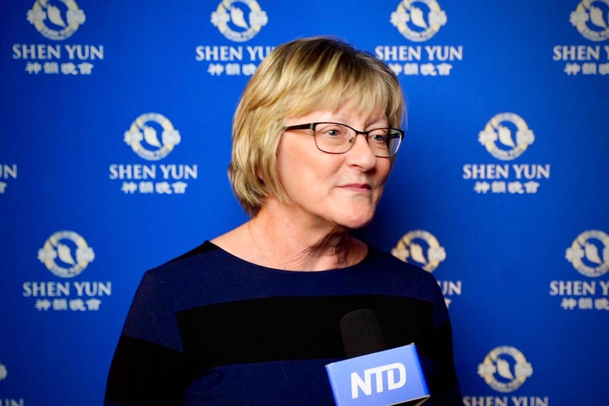 Audience Member Transfixed by Heavenly Scenes in Shen Yun