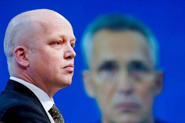 Norway's former Finance Minister Trygve Slagsvold Vedum presents NATO Secretary General Jens Stoltenberg as Norway's new central bank chief at a news conference in Oslo, Norway, dated Feb. 4, 2022. (Terje Bendiksby/NTB via Reuters)