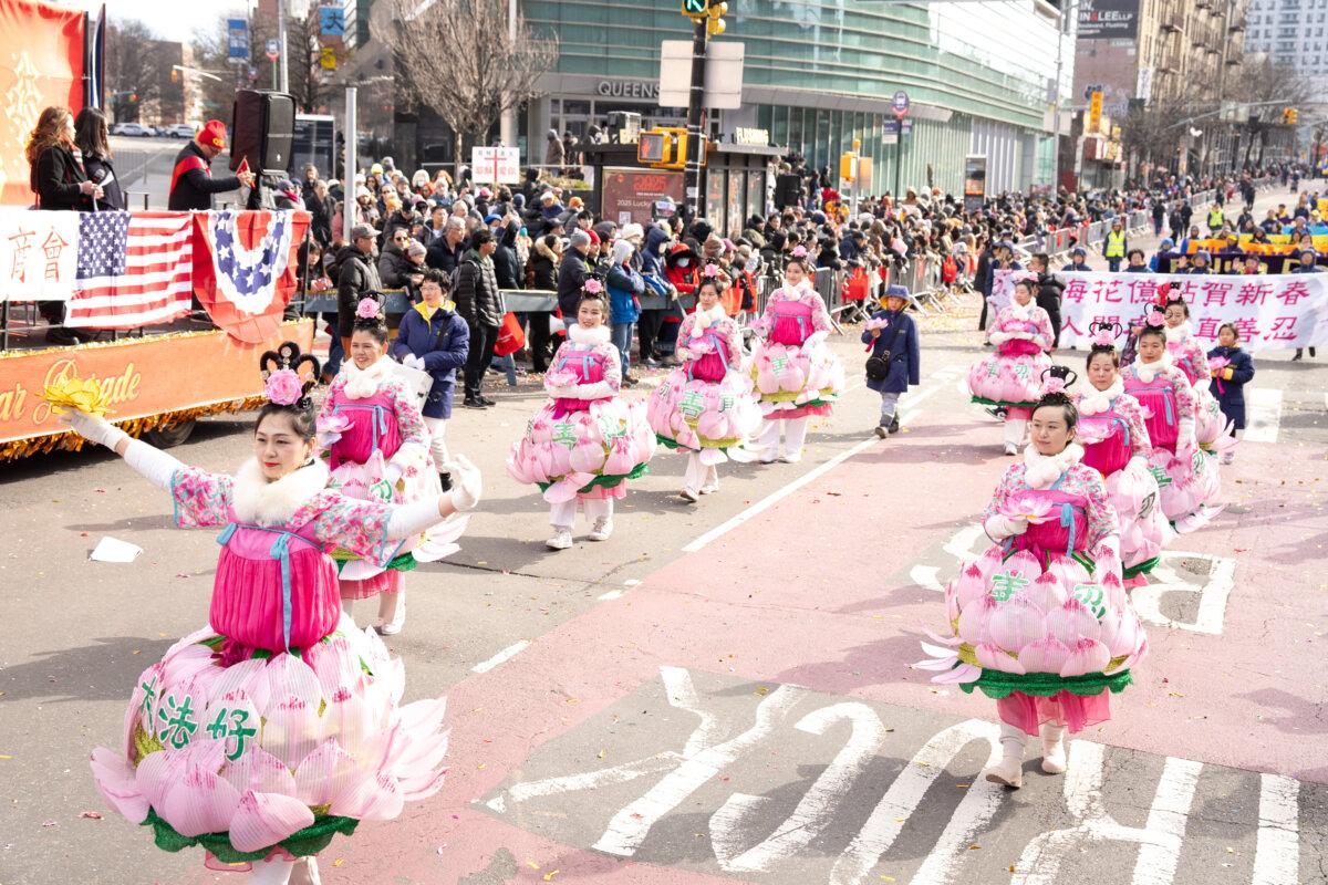 Falun Gong practitioners take part in the parade in the Flushing neighborhood of Queens, N.Y., on Feb. 1, 2025. (Larry Dye/The Epoch Times)