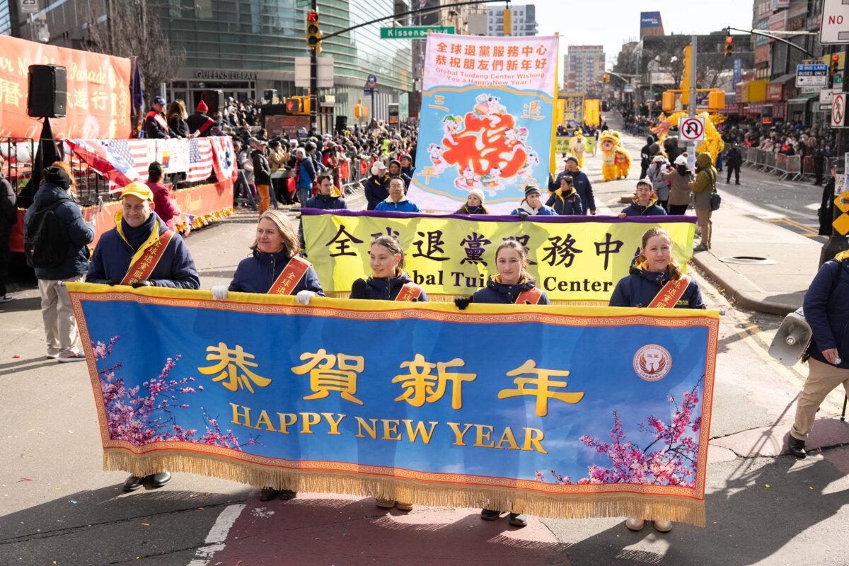 Falun Gong practitioners take part in the parade in the Flushing neighborhood of Queens, N.Y., on Feb. 1, 2025. (Larry Dye/The Epoch Times)