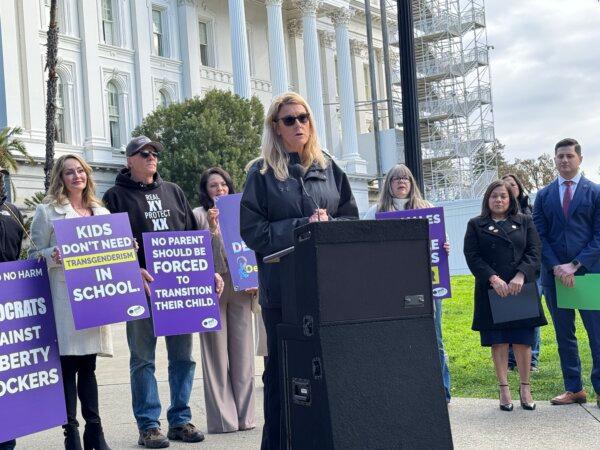 Melissa Batie-Smoose, <span style="font-weight: 400;">a </span>former assistant coach of the Spartans Women’s Volleyball team at San Jose State University who was fired for joining the Title IX lawsuit against the NCAA and Mountain West Conference, speaks at a press conference outside California’s state Capitol Building in Sacramento on Feb. 14, 2025. (Courtesy Greg Burt/California Family Council)