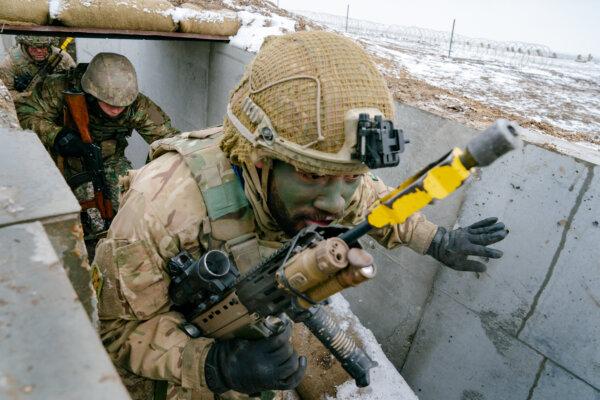 British soldiers practice an assault in Smardan, Romania, on Feb. 17, 2025. (Andrei Pungovschi/Getty Images)