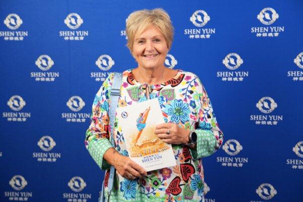 Kay Gregan, a travel broker, watches Shen Yun Performing Arts at the Kiri Te Kanawa Theatre, Aotea Centre in Auckland, New Zealand, on Feb. 23, 2025. (NTD)