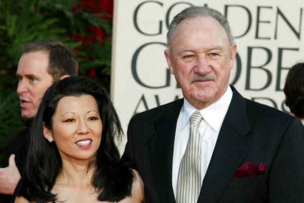 Gene Hackman and his wife Betsy Arakawa arrive at the 60th Annual Golden Globe Awards held at the Beverly Hilton Hotel in Los Angeles, Calif., on Jan. 19, 2003. (Kevin Winter/Getty Images)