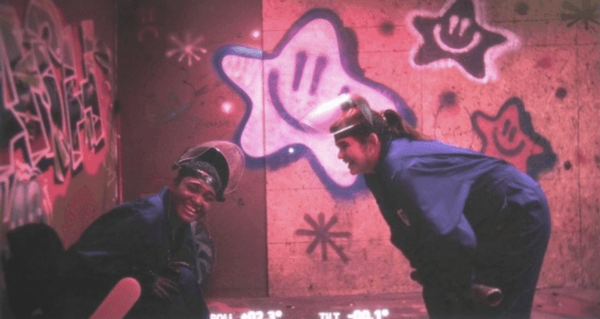 Best friends Daphne (Lauren "Lolo" Spencer, L) and Lily (Barbie Ferreira) celebrate a successfully cathartic baseball-bat bashing session in a rage room, in "Bob Trevino Likes It." (Roadside Attractions)