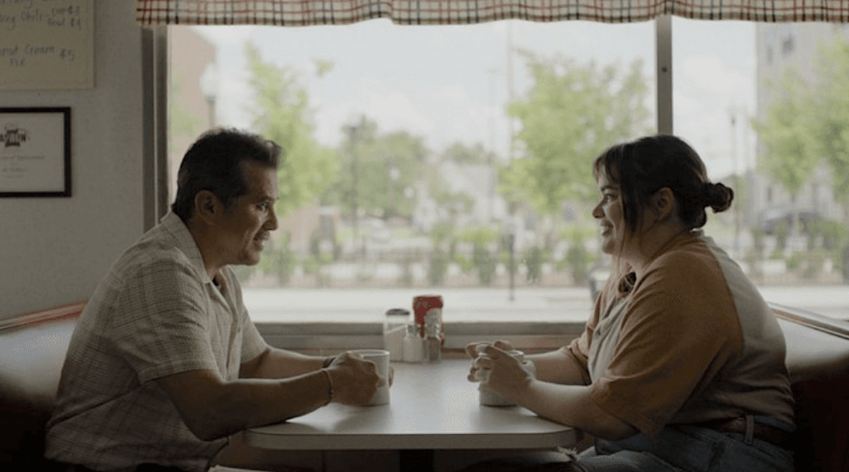 Bob (John Leguizamo) and Lily (Barbie Ferreira) chat in a diner, in "Bob Trevino Likes It." (Roadside Attractions)