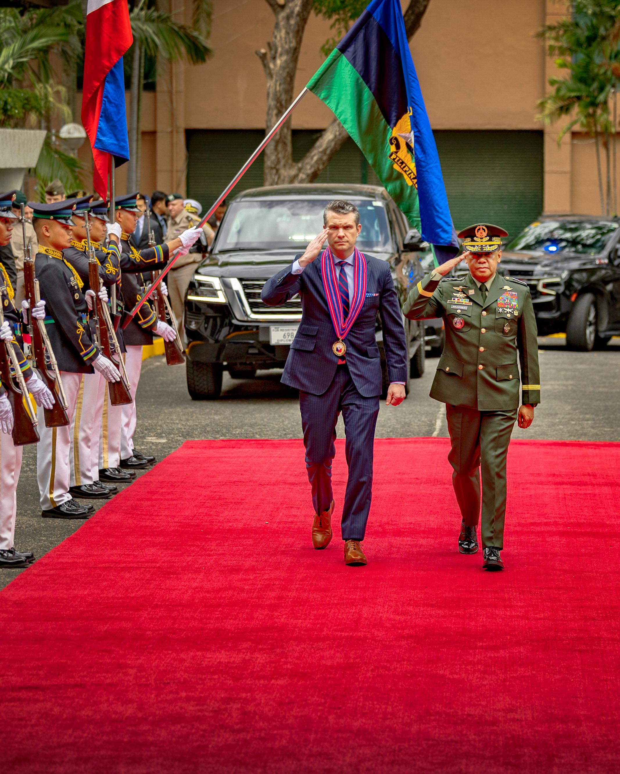 Day in Photos: Pete Hegseth Visits Philippines, Earthquake in Burma, and JD Vance in Greenland