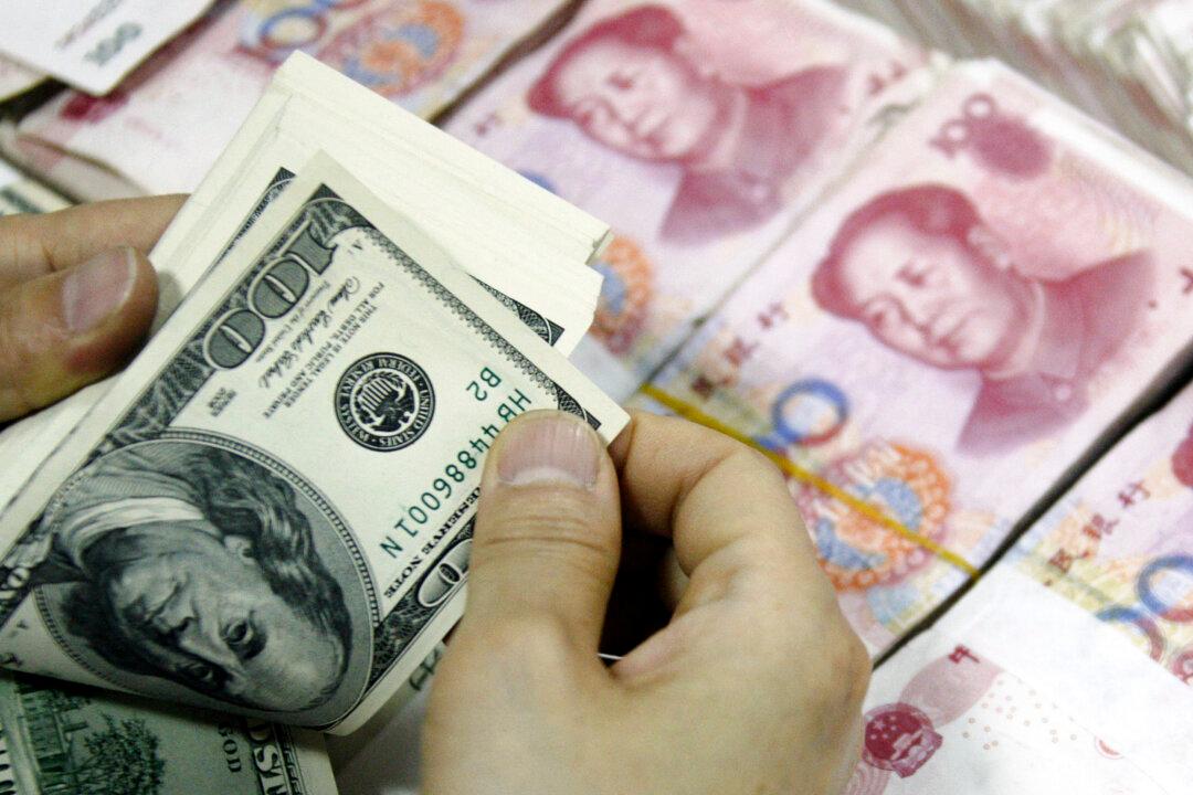 Countering US Tariff Hikes, Yuan Exchange Rate Falls Below 7.4