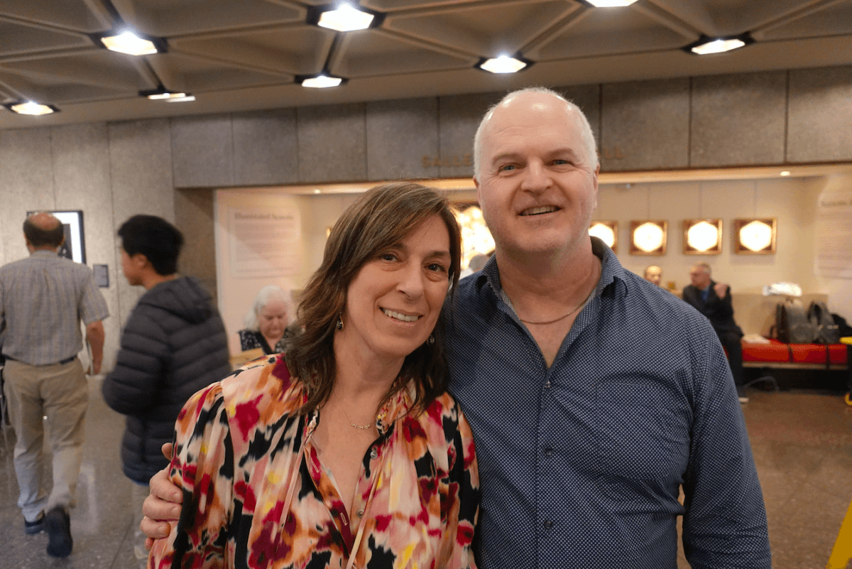 Annette Patel and Wayne Bishop watch Shen Yun Performing Arts at the National Arts Centre in Ottawa, Canada, on April 19, 2025. (Daniella Wollensak/The Epoch Times)