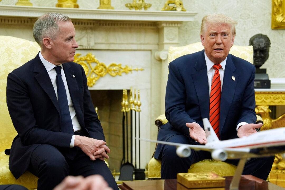 Trump Says ‘Never Say Never’ as Carney Tells Him Canada Not for Sale